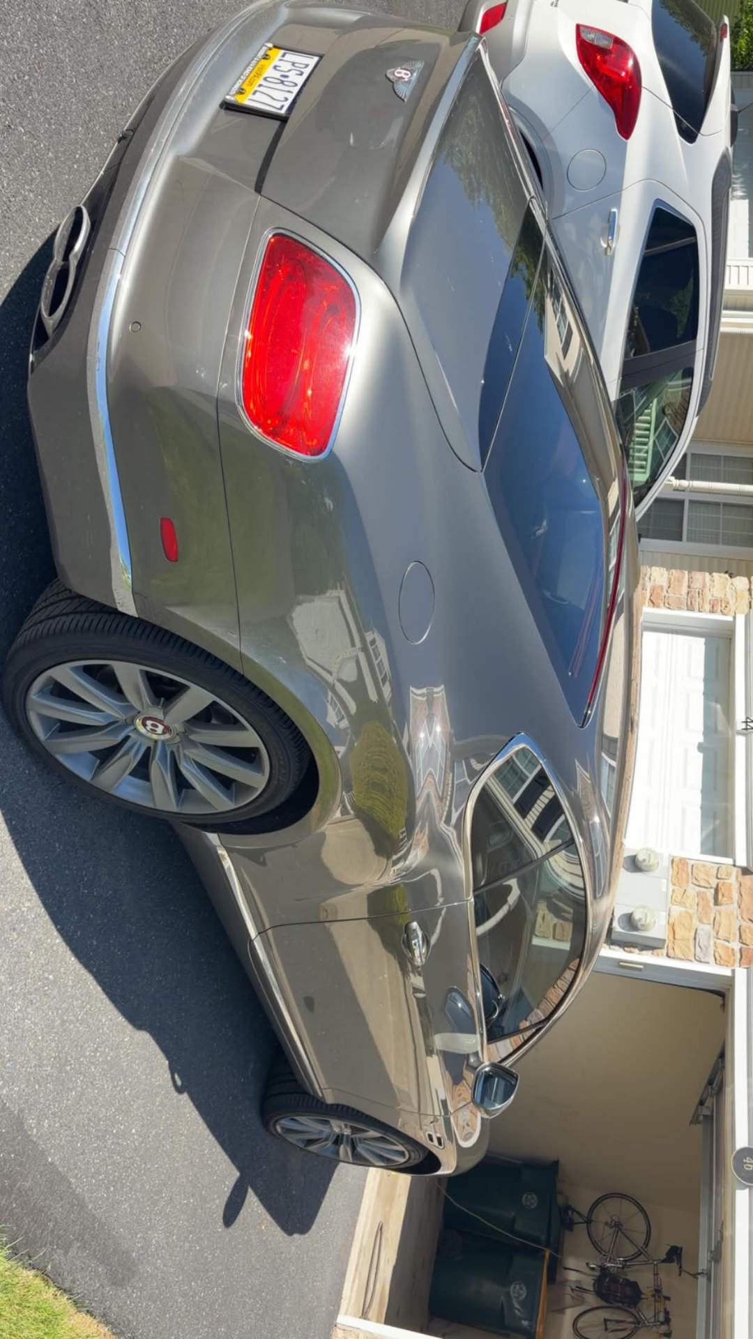 Detailed Bentley with mirror-finish paint
